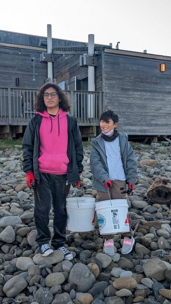 Two young volunteers at PBC's 28th Annual Beach Planting and Cleanup